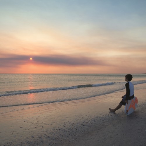 Skimboarders